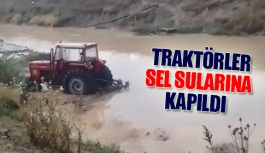 Traktörler sel sularına kapıldı 