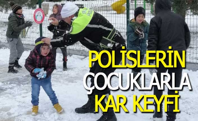 Polislerin çocuklarla kar keyfi